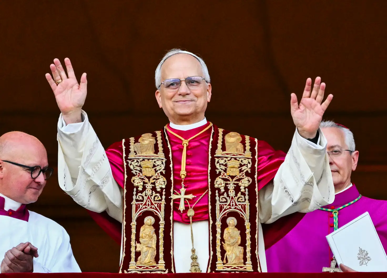 Pope Leo called for the end of a war of words between people and praised journalists(ALBERTO PIZZOLI/AFP via Getty Images)