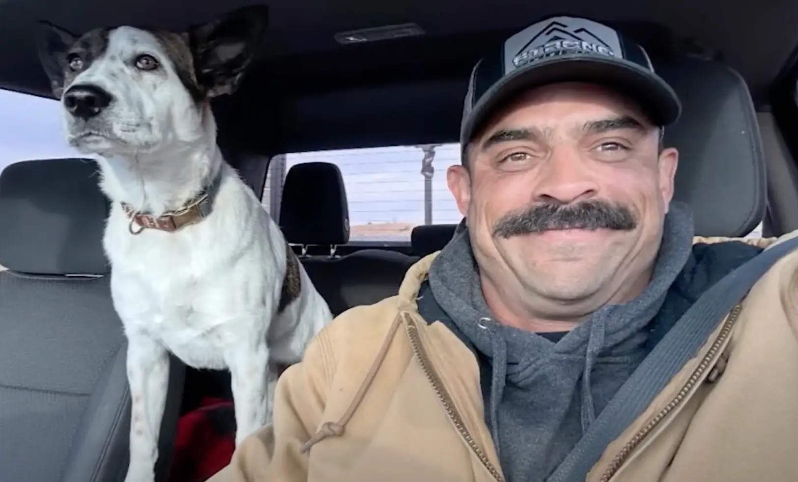 Marcus Freiberger pictured with his dog, Thomas (FOX 10)