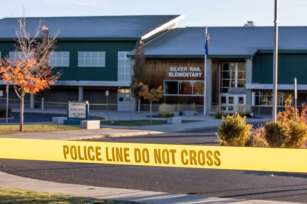 Four people, including three children aged 5, 8 and 11, were killed during the shooting. (Payton Bruni / AFP via Getty Images)