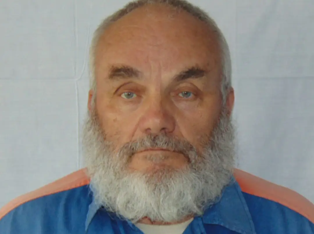 Titus was 27 miles away at the time of the killings.