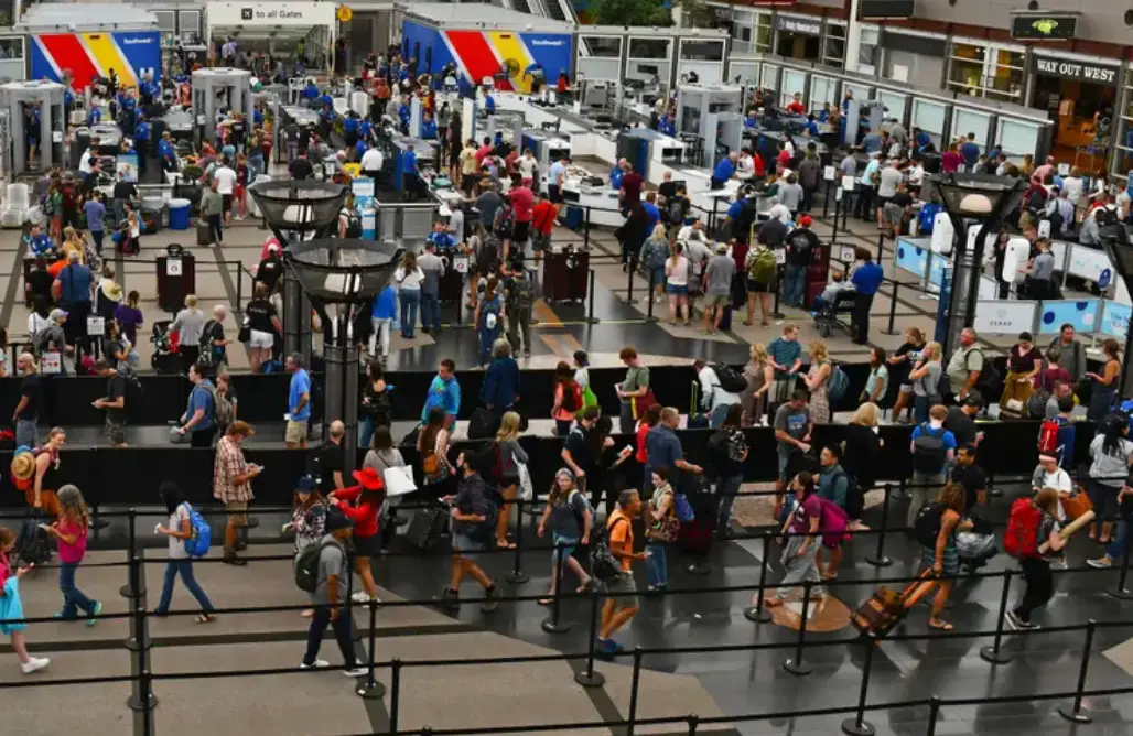 The queues at airport security can get a bit sweaty for all of us (Getty Stock Image)