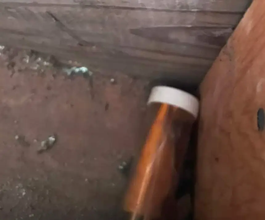 The note was hidden in a hole in the wall.