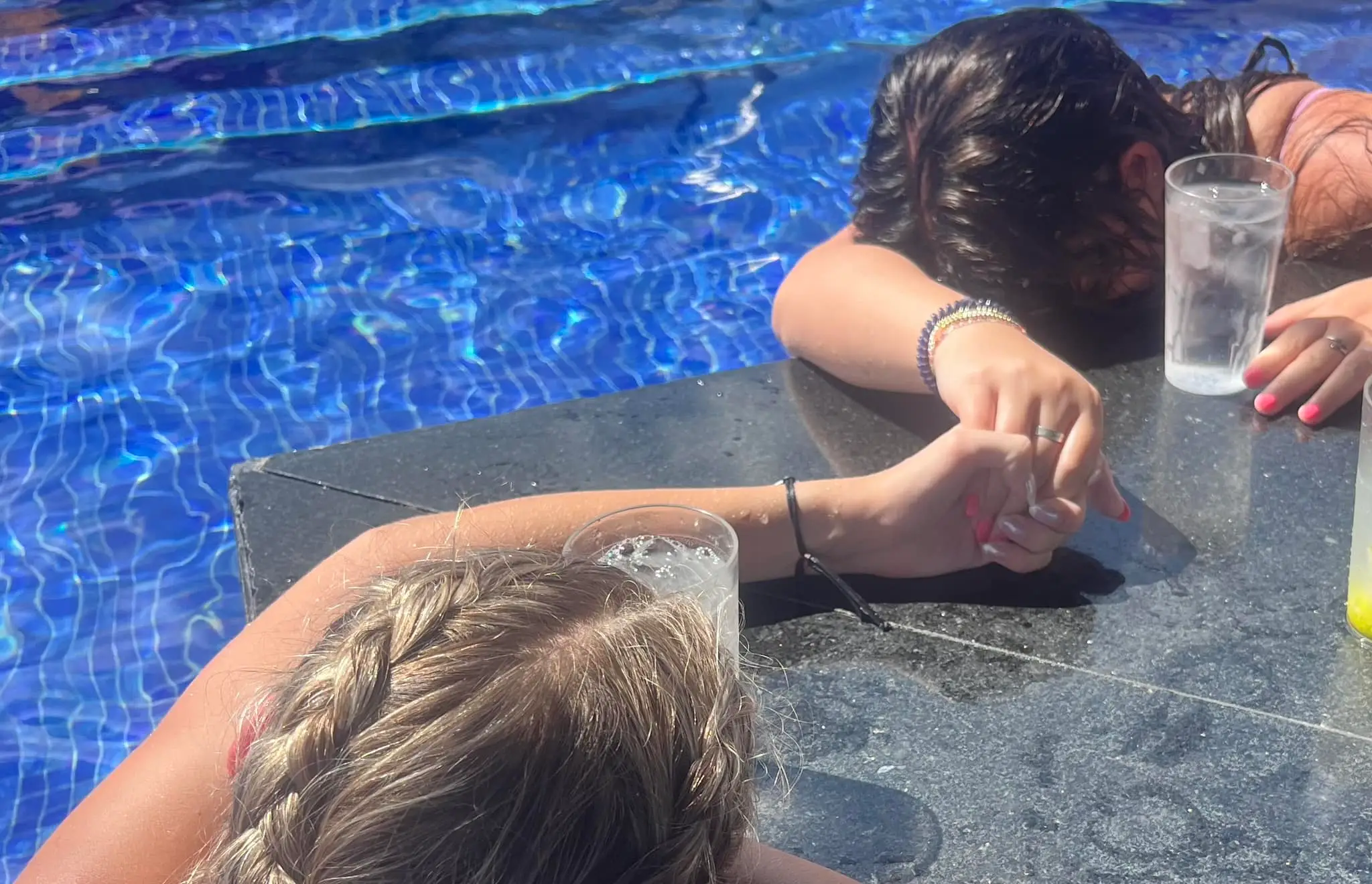 A photo shows Zara and Kaylie seemingly passed out the swim-up bar. (Facebook/Rilee Works)