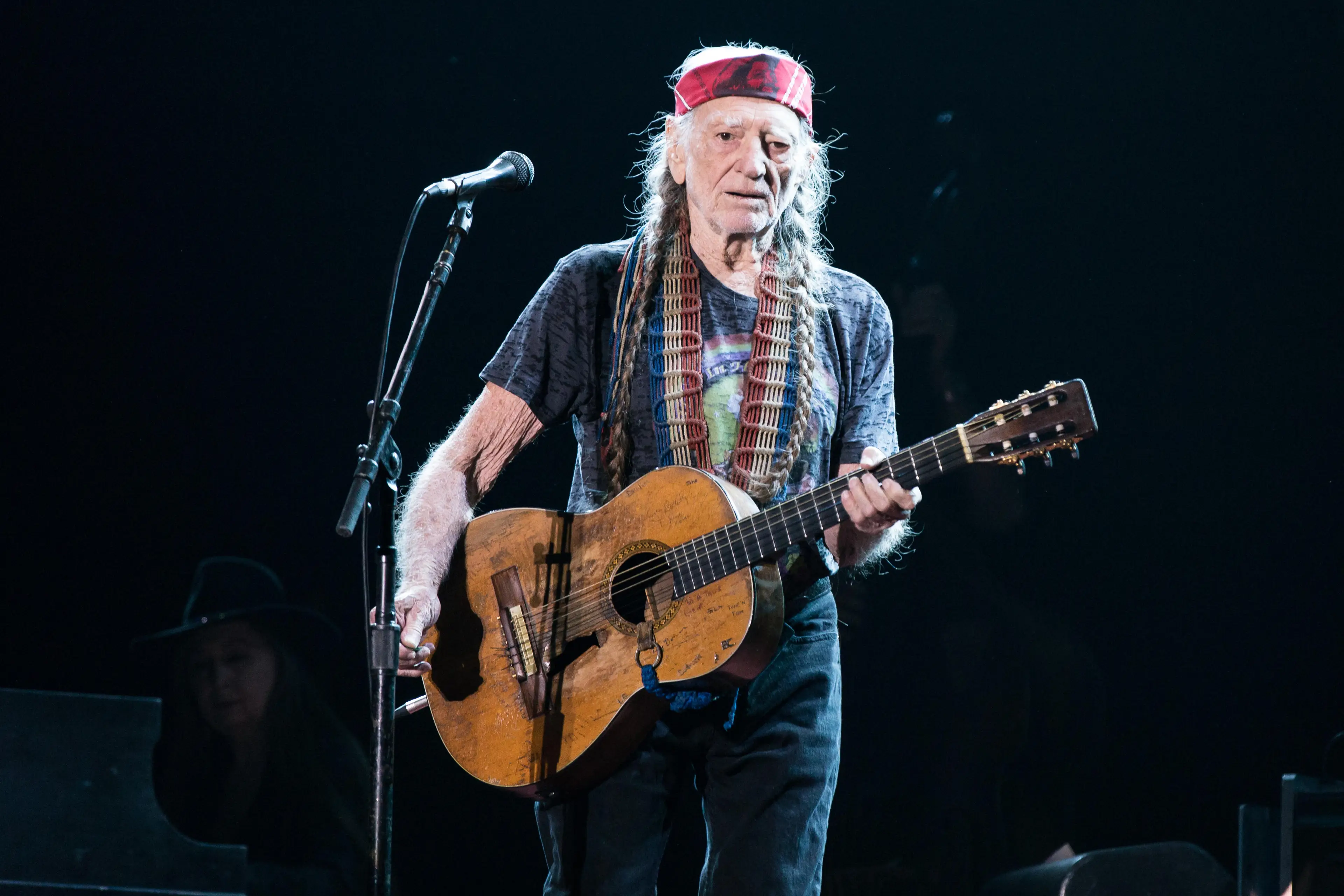 Harrelson said he was drawn back in by Willie Nelson.