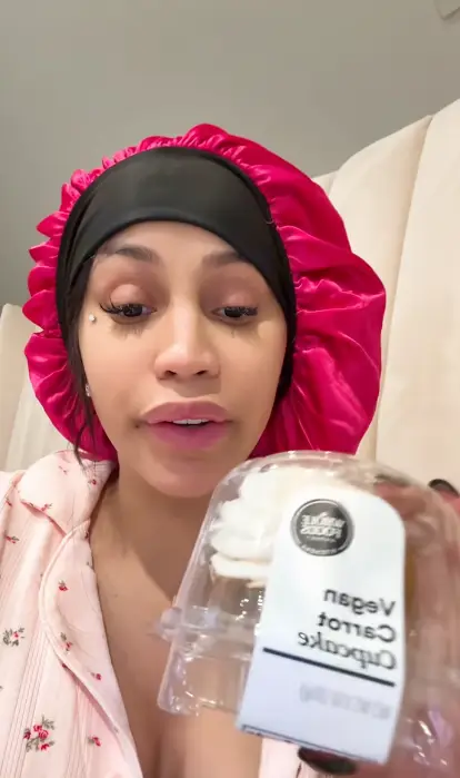 She held a cupcake up to the camera when addressing the controversy (iamcardib/TikTok)