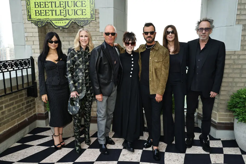 Jenna Ortega, Catherine O'Hara, Michael Keaton, Winona Ryder, Justin Theroux, Monica Bellucci and Tim Burton (Theo Wargo/Getty Images)