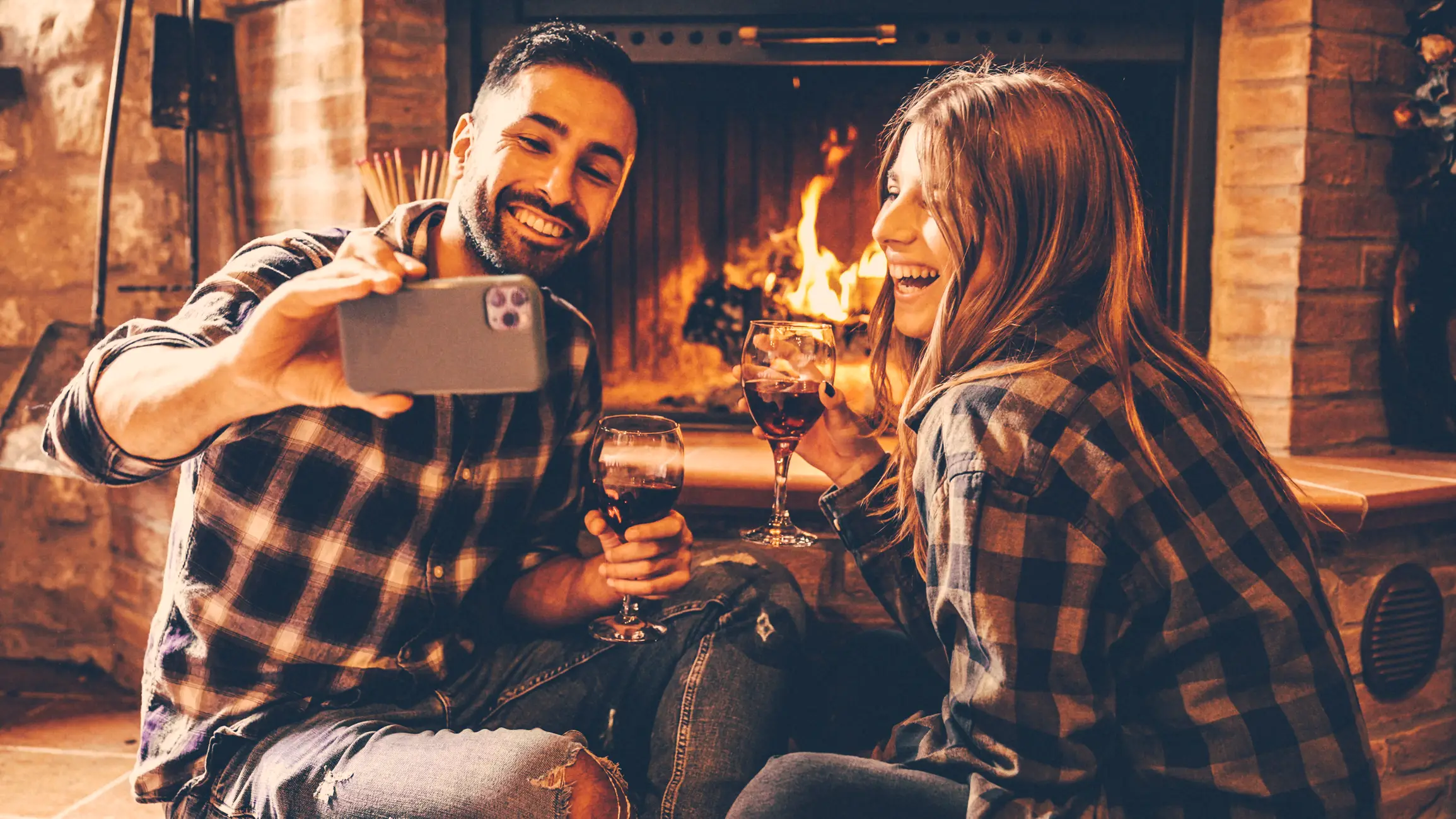 Here's to cuddling, coupling and cuffing up during the winter months, cheers! (Getty stock)
