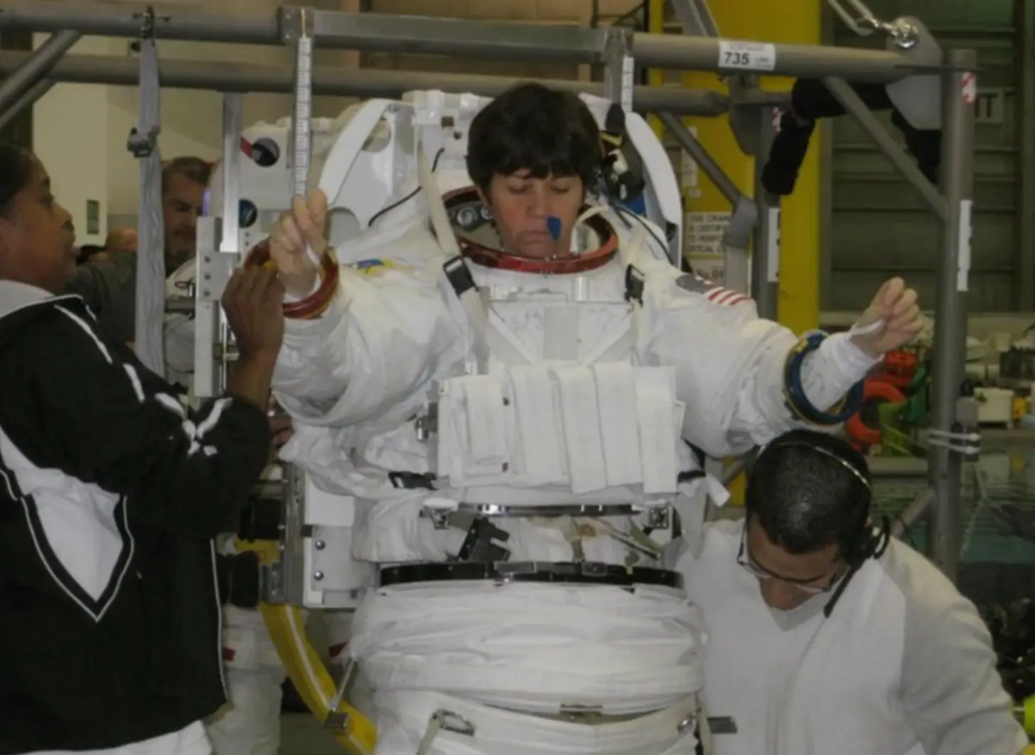 Coleman explains that wearing a spacesuit often results in cuts and bruises. (Vimeo/Eg)