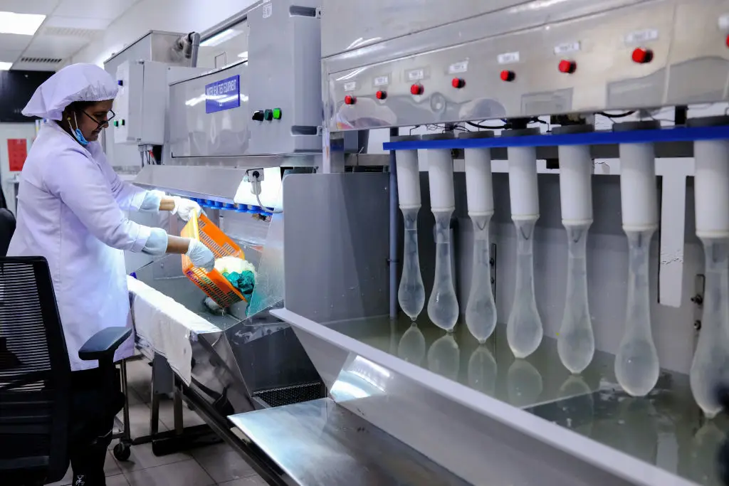 Condoms being made at Karex in Malaysia (Samsul Said/Bloomberg via Getty Images)