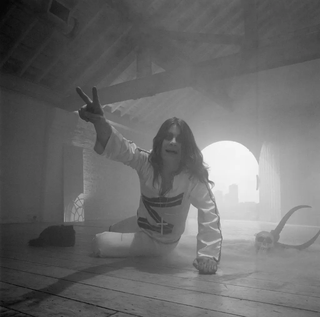 Ozzy was known for throwing double peace signs (Fin Costello/Redferns/Getty Images)