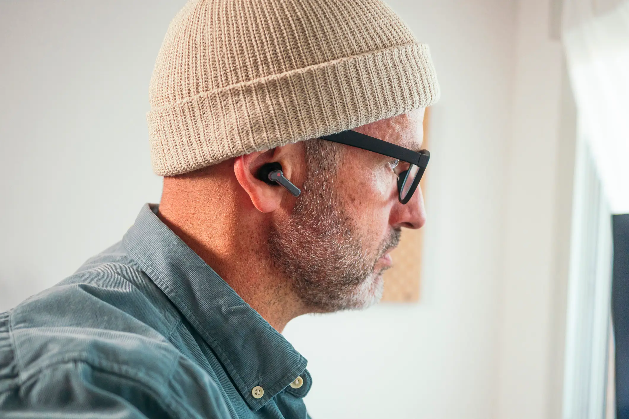 Scientists are divided over the health risks of wireless headphones (Getty Stock Images)