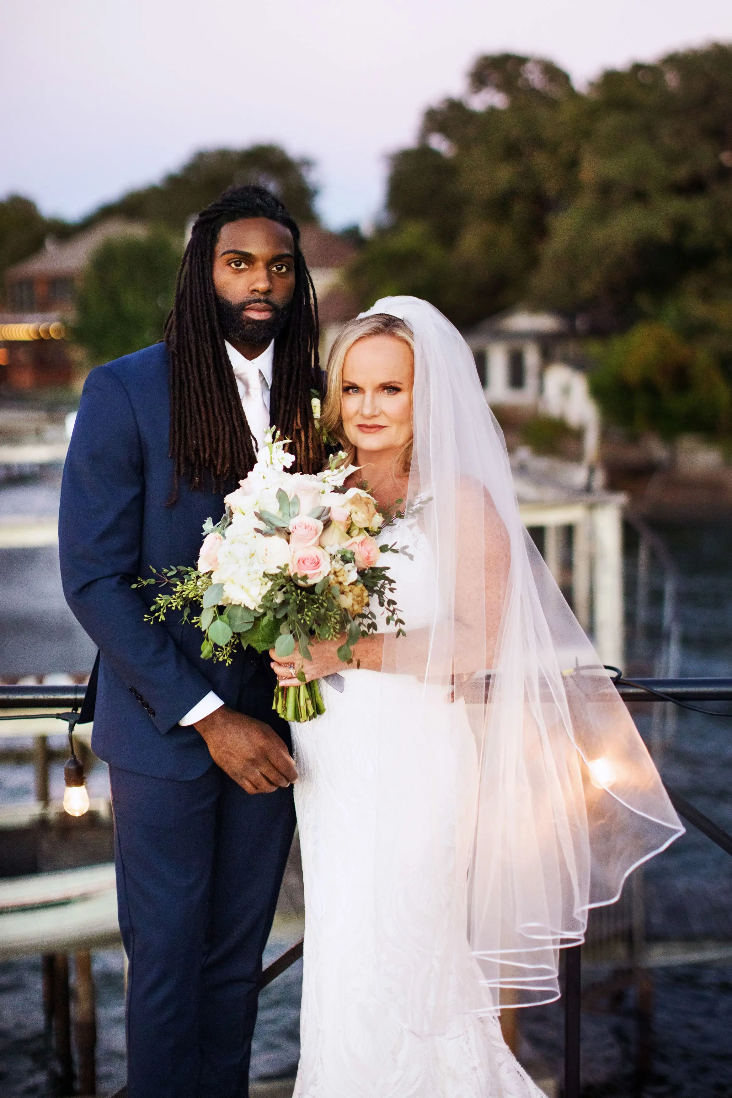 The couple tied the knot with fireworks and a boat ride across a lake.