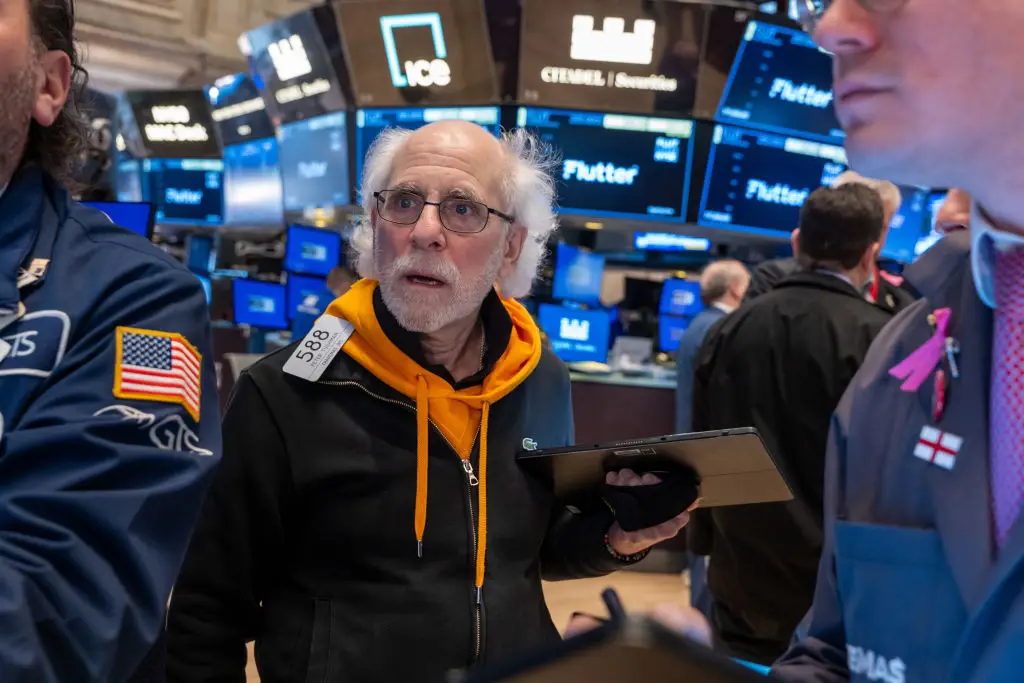 The stock market expert says people should invest in stocks rather than 'stuff' (Spencer Platt/Getty Images)