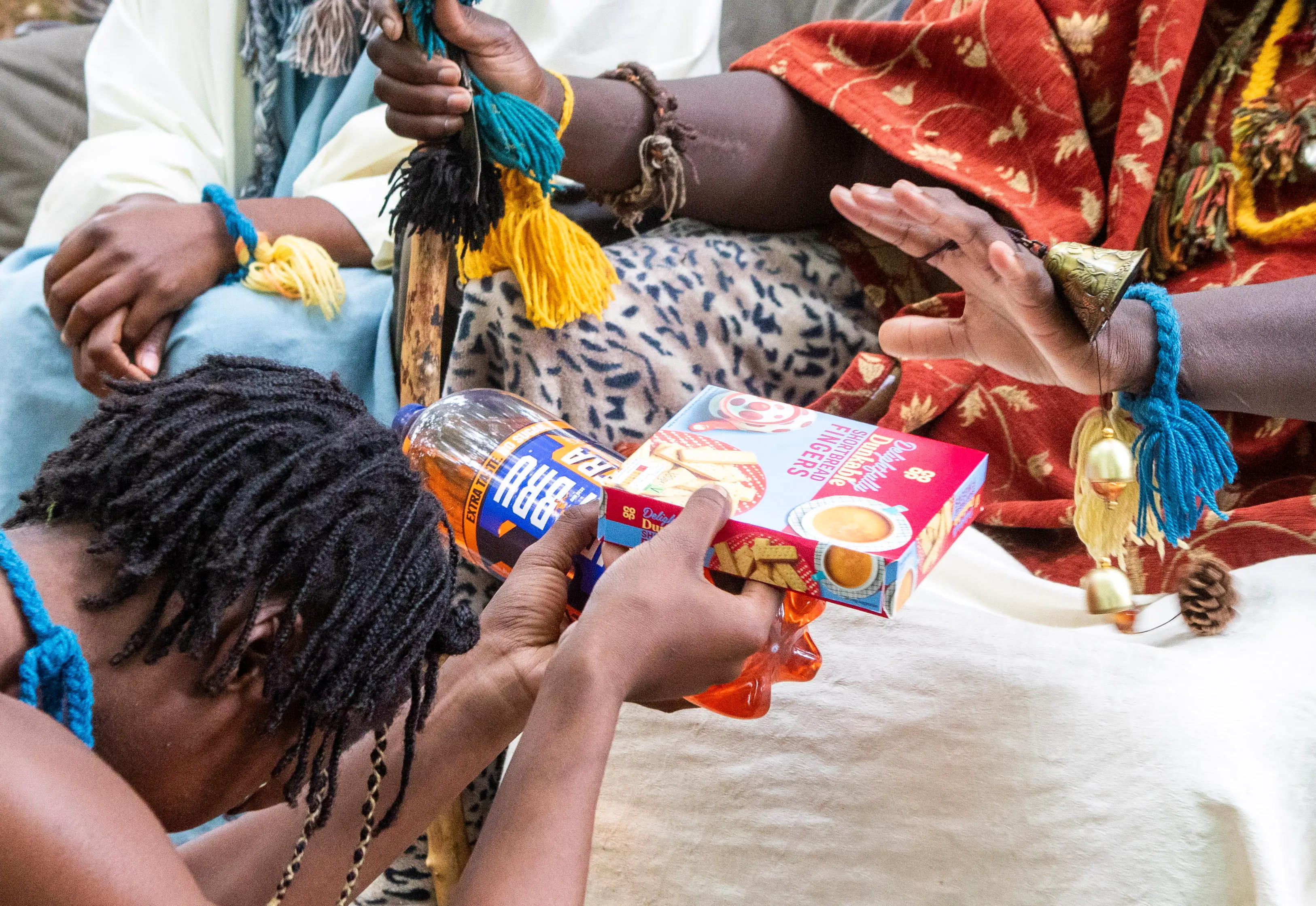 Taylor making offerings to 'the King' (SWNS)