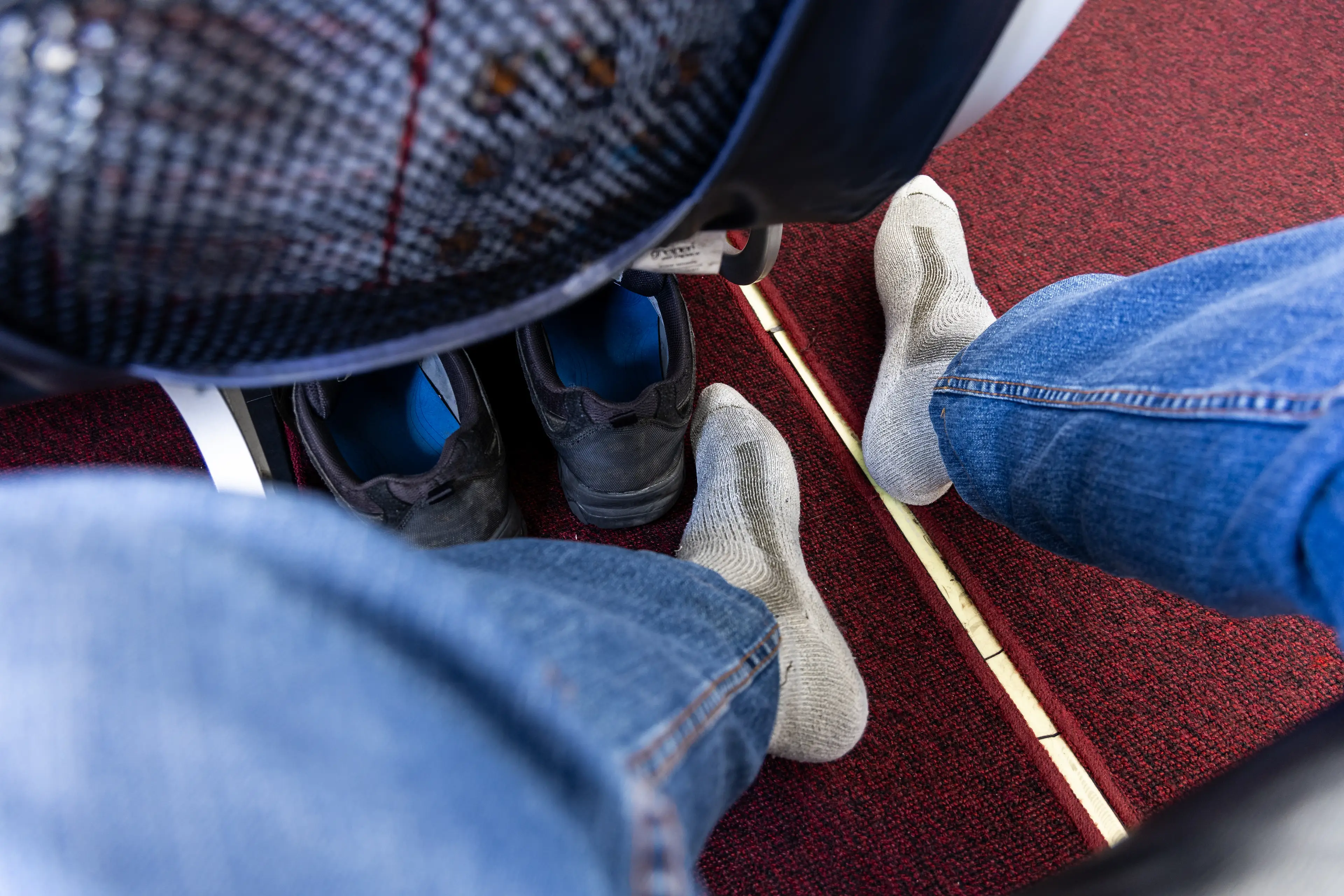 The flight attendant has a warning for any passengers taking their shoes off (Getty Stock Photo)