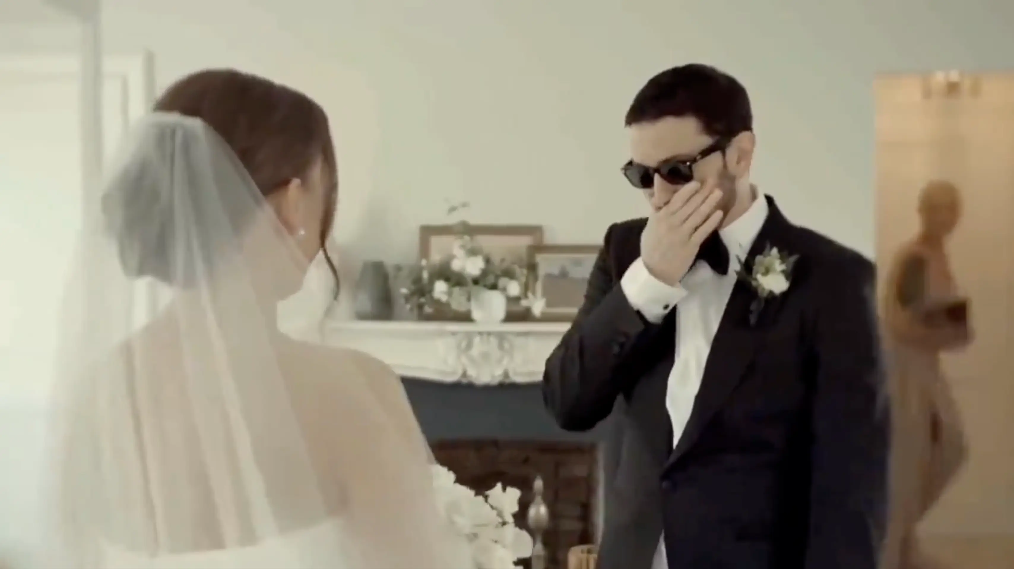 Kim is visible in the background of the video (YouTube/EminemMusic)