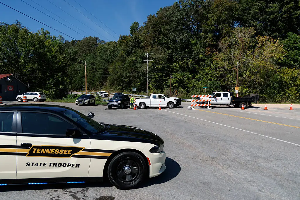 Police and Department of Transportation workers block the road leading to Accurate Energetic Systems in McEwen, Tennessee, following multiple explosions (Brett Carlsen/Getty Images)