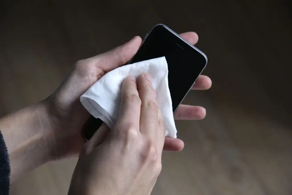 Dr Rao recommends sanitising hands before using a phone and cleaning the device itself 'several times a week' to cut down on the risk of infection. (Photo by: TIROT/BSIP/Universal Images Group via Getty Images)