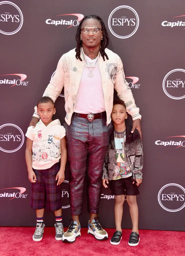 Johnson's twin sons, CJ and Kaden, are both 14 and play football competitively. (Photo by Alberto E. Rodriguez/Getty Images)