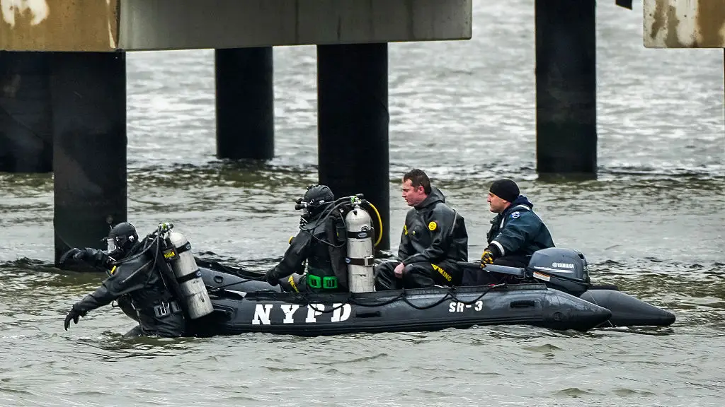NYPD scuba divers were dispatched to the scene. (Photo by Eduardo Munoz Alvarez/Getty Images)