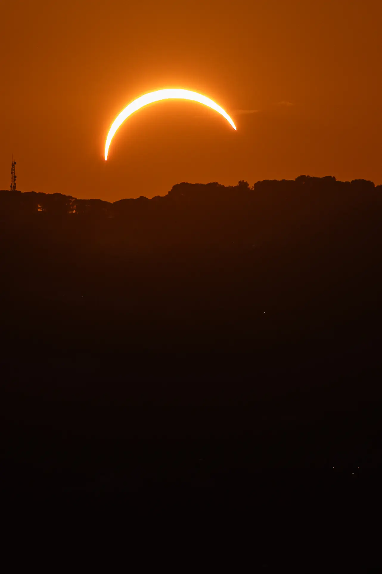 The partial solar eclipse is seen over the Mediterranean Sea in Cap d'Antibes, France. (Manuel Romano/NurPhoto via Getty Images)