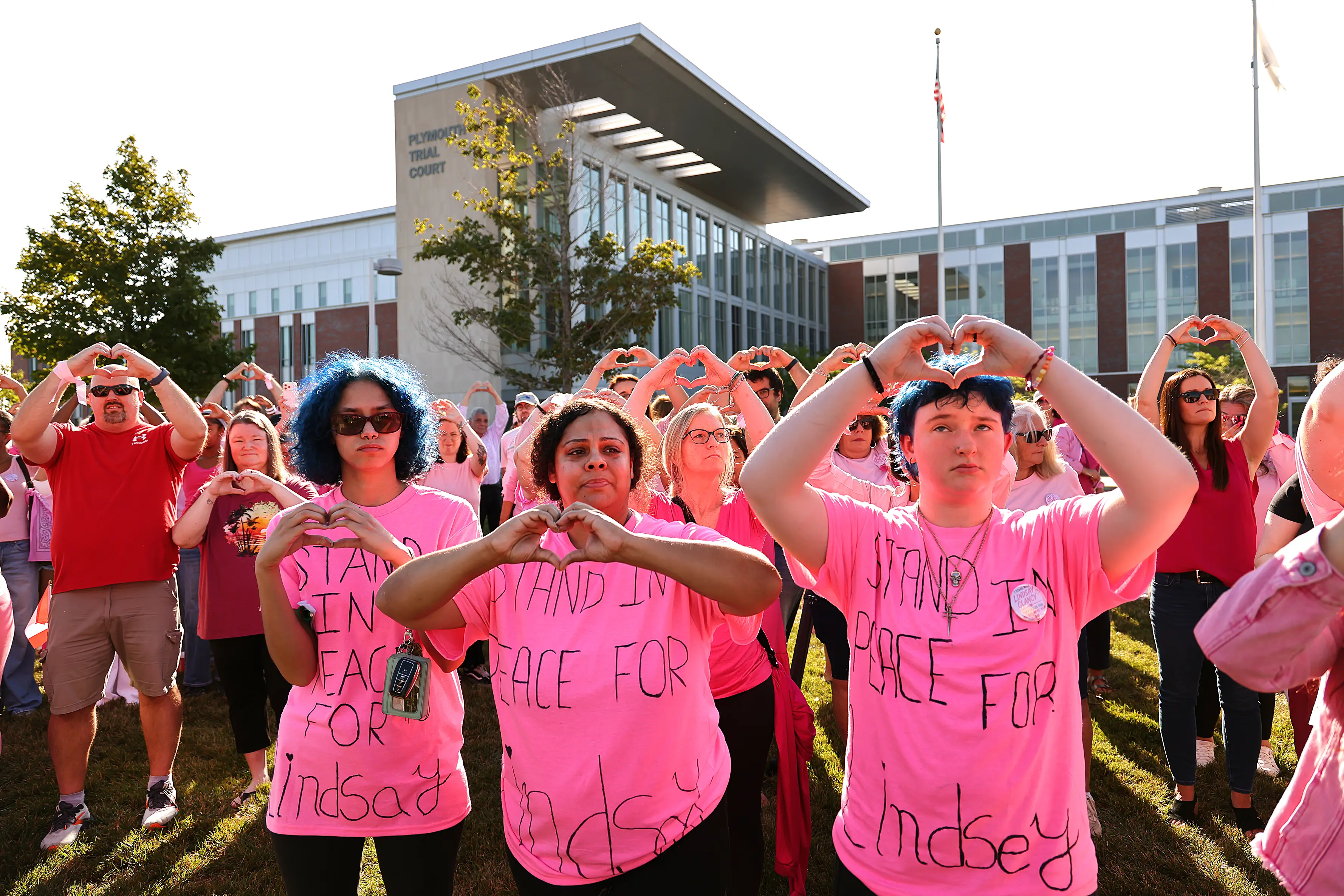 People wearing pink have been forming crowds outside the trial (John Tlumacki/The Boston Globe via Getty Images)
