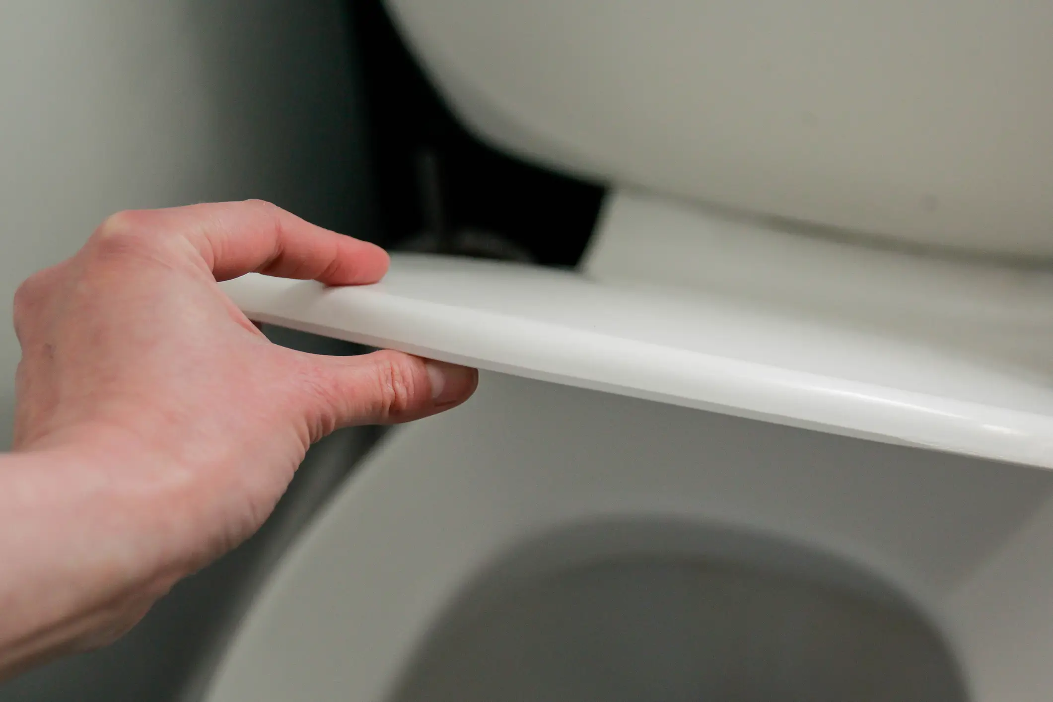 Science says you should flush with the lid down to reduce the risk of breathing in airborne bacteria (Getty Images)
