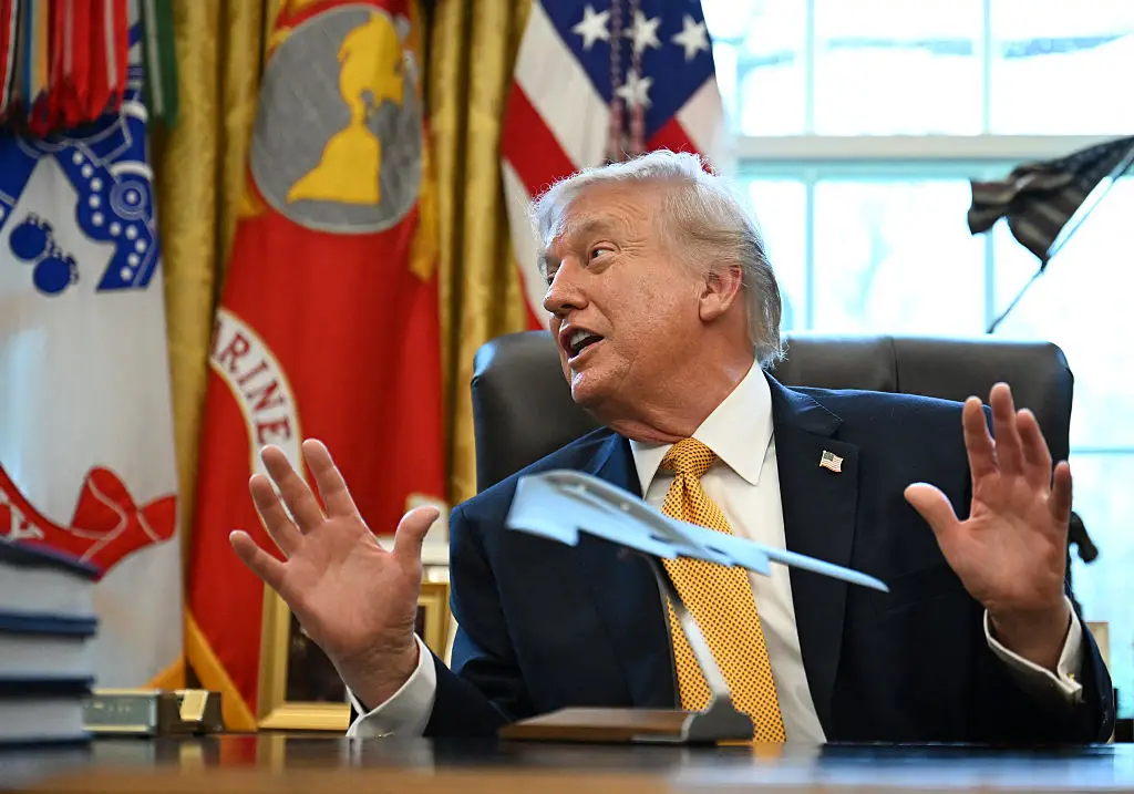 The President was discussing the Iran conflict and WW3 before going off on a tangent about the model plane (ANNABELLE GORDON / AFP via Getty Images)