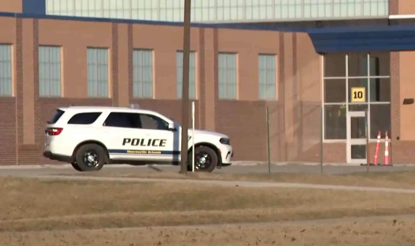 Police outside Moorseville High School following a tip about a mass shooting (WTHR)