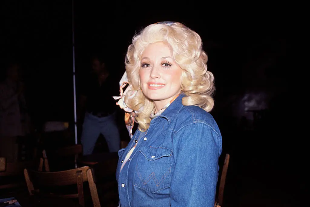 Dolly Parton's blonde hair is a major part of her iconic look (Bettmann / Contributor)