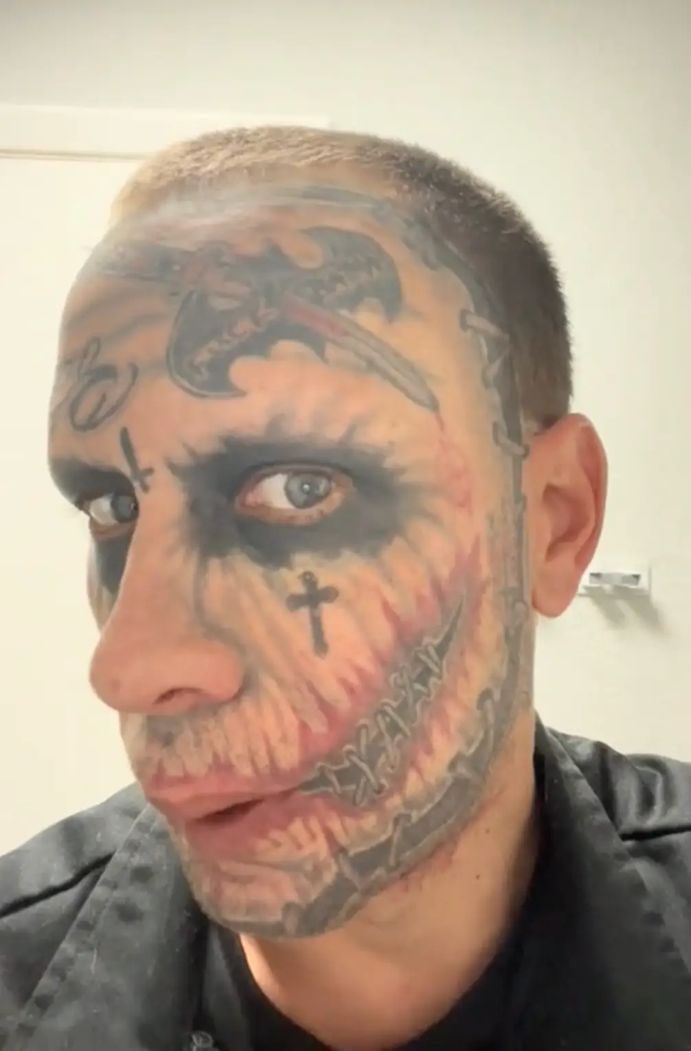 Sullivan's tattoos look like the DC character's scars.