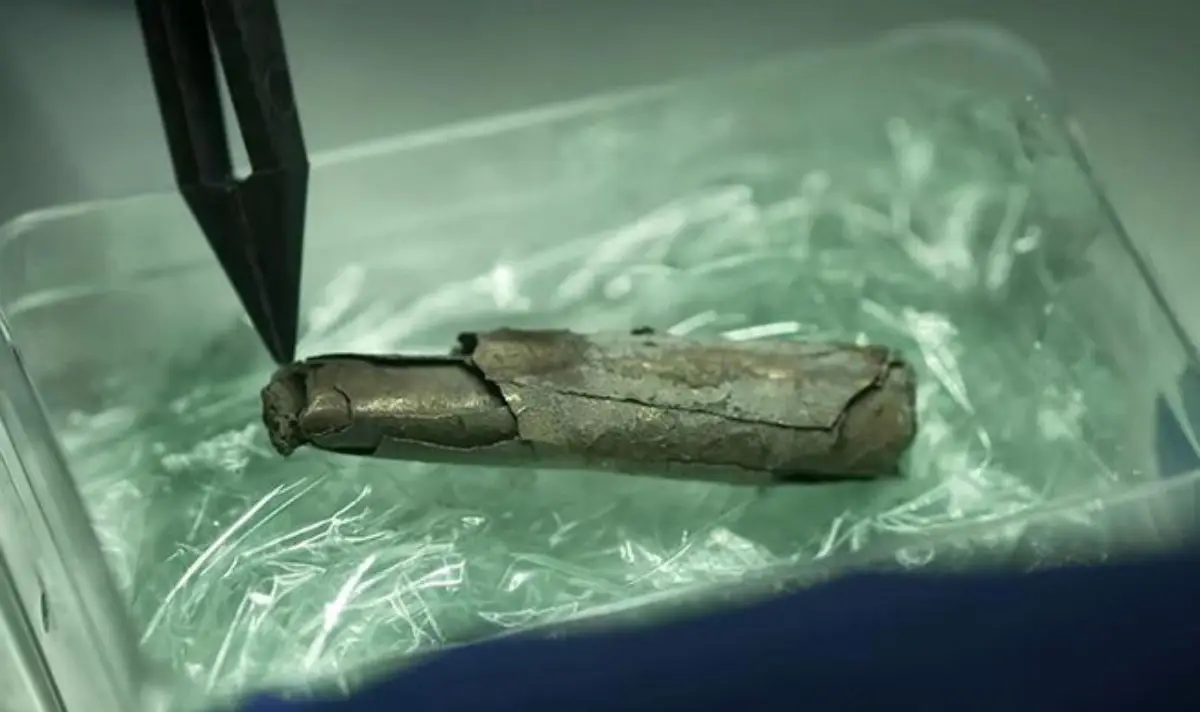 The silver foil reportedly shows how 'devout' the man was in his Christian faith (Stadt Frankfurt/YouTube)