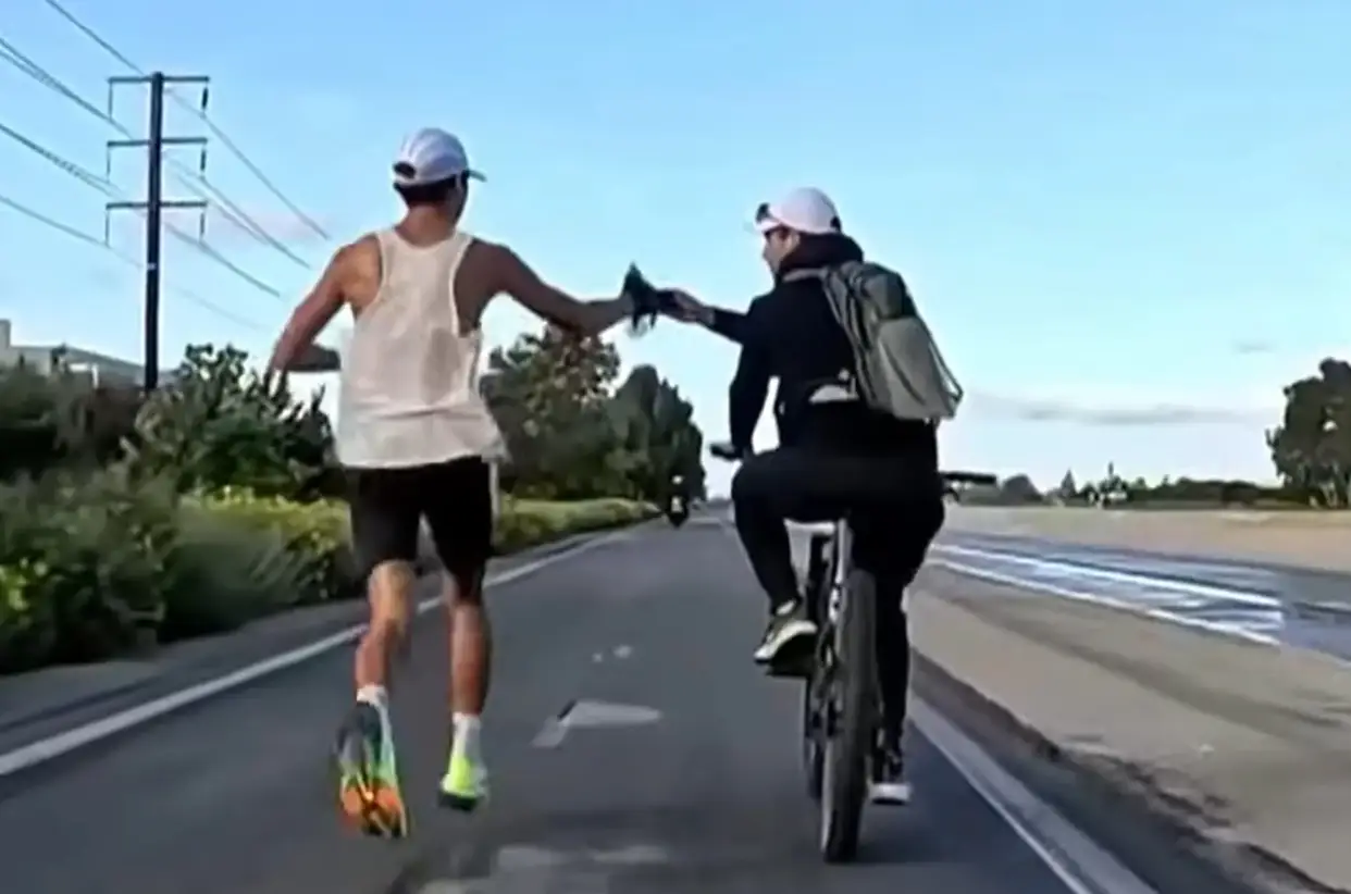 Prado's father was seen offering some water. (NBC 4/OC Marathon)