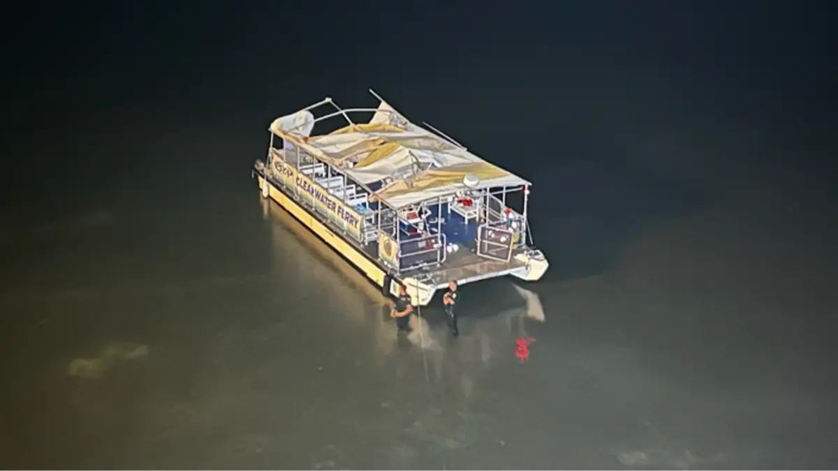 Huge rescue operation underway with at least one dead after boat crashes into ferry carrying up to 50 passengers