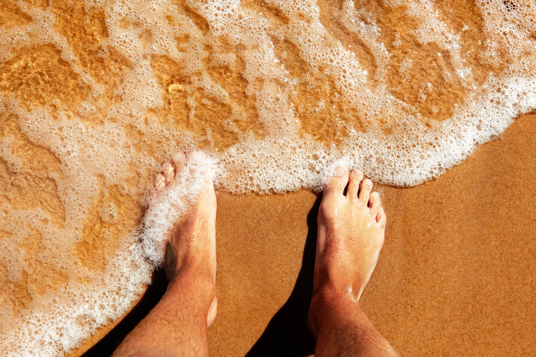 Many have suspected a twisted serial killer, the mafia are responsible for human feet washing ashore.