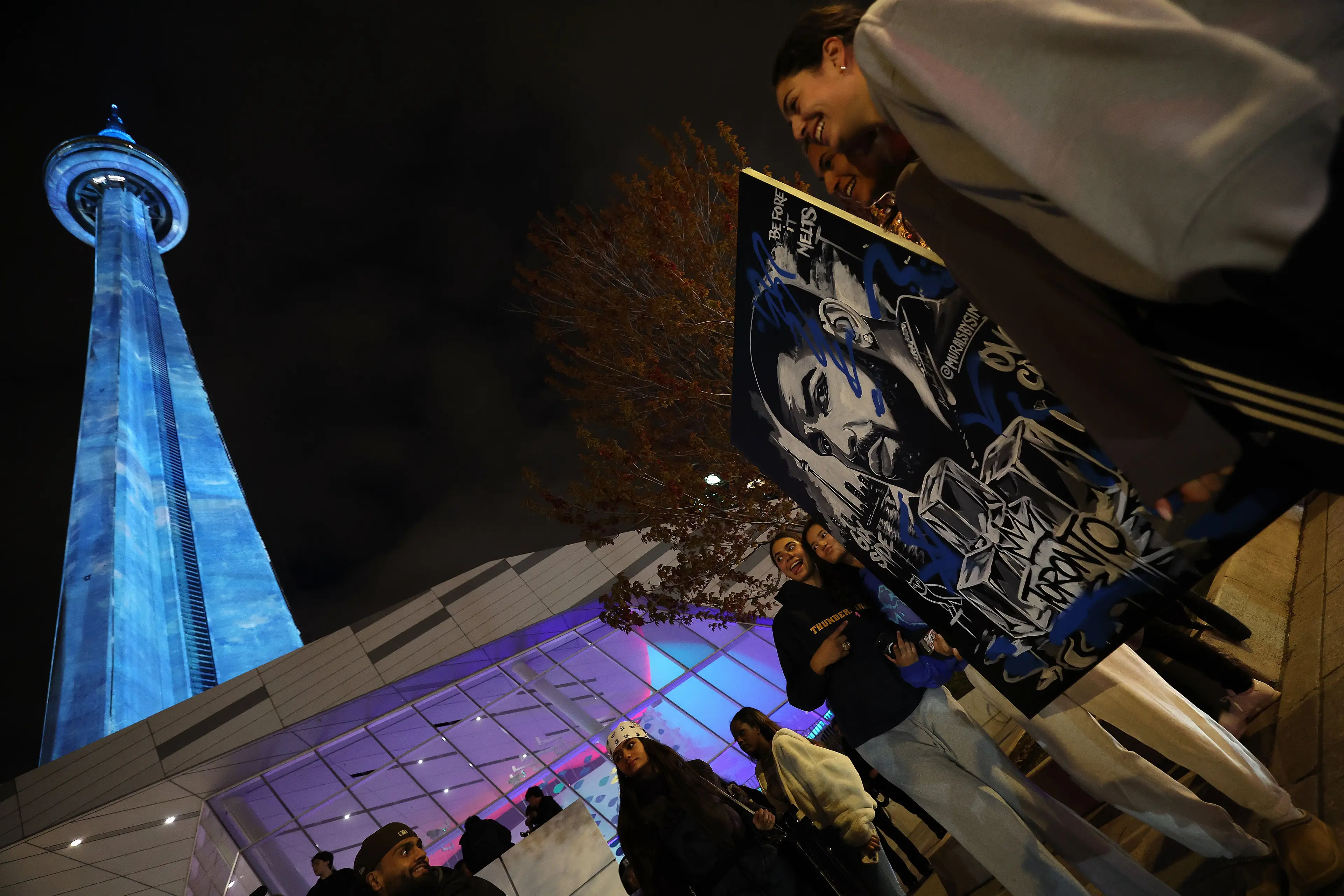 Scenes from the bottom of the CN Tower as Drake's album ICEMAN is released. (Steve Russell/Toronto Star via Getty Images)