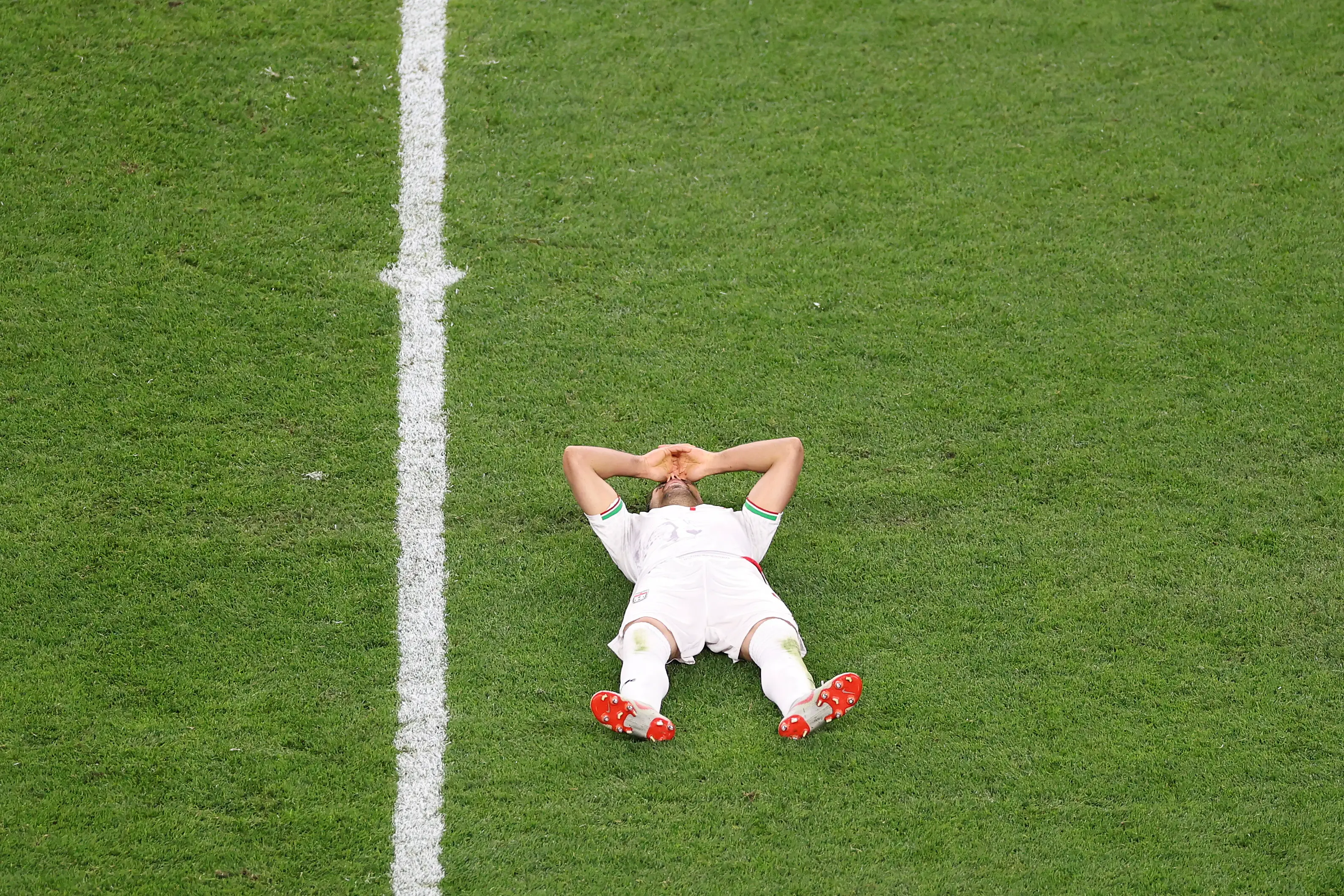 Iran's head coach Amir Ghalenoei claimed his side had been the 'most oppressed' team in the World Cup (Stu Forster/Getty Images)