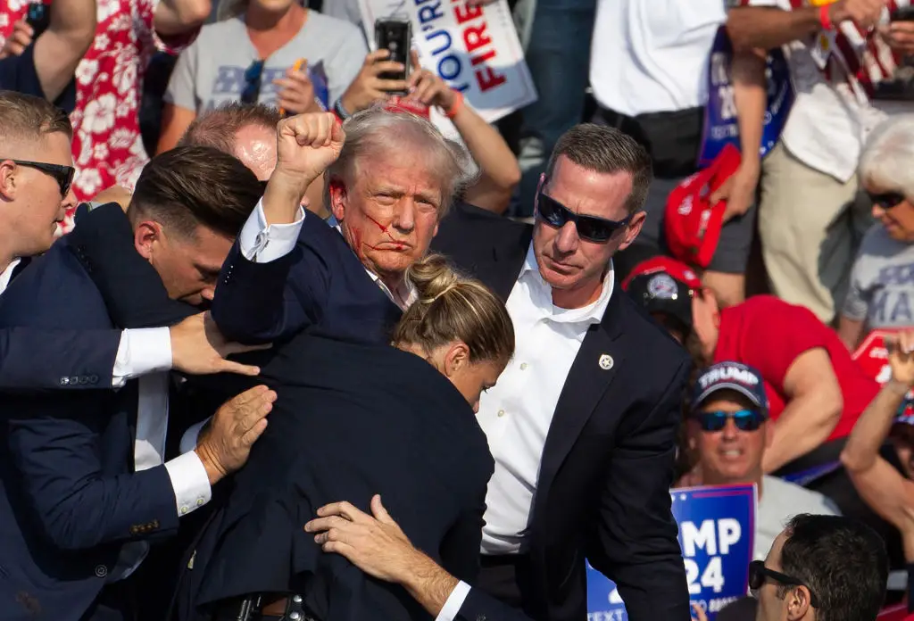 Trump narrowly escaped assassination on Saturday after a bullet pierced through the top of his right ear. (REBECCA DROKE/AFP via Getty Images)