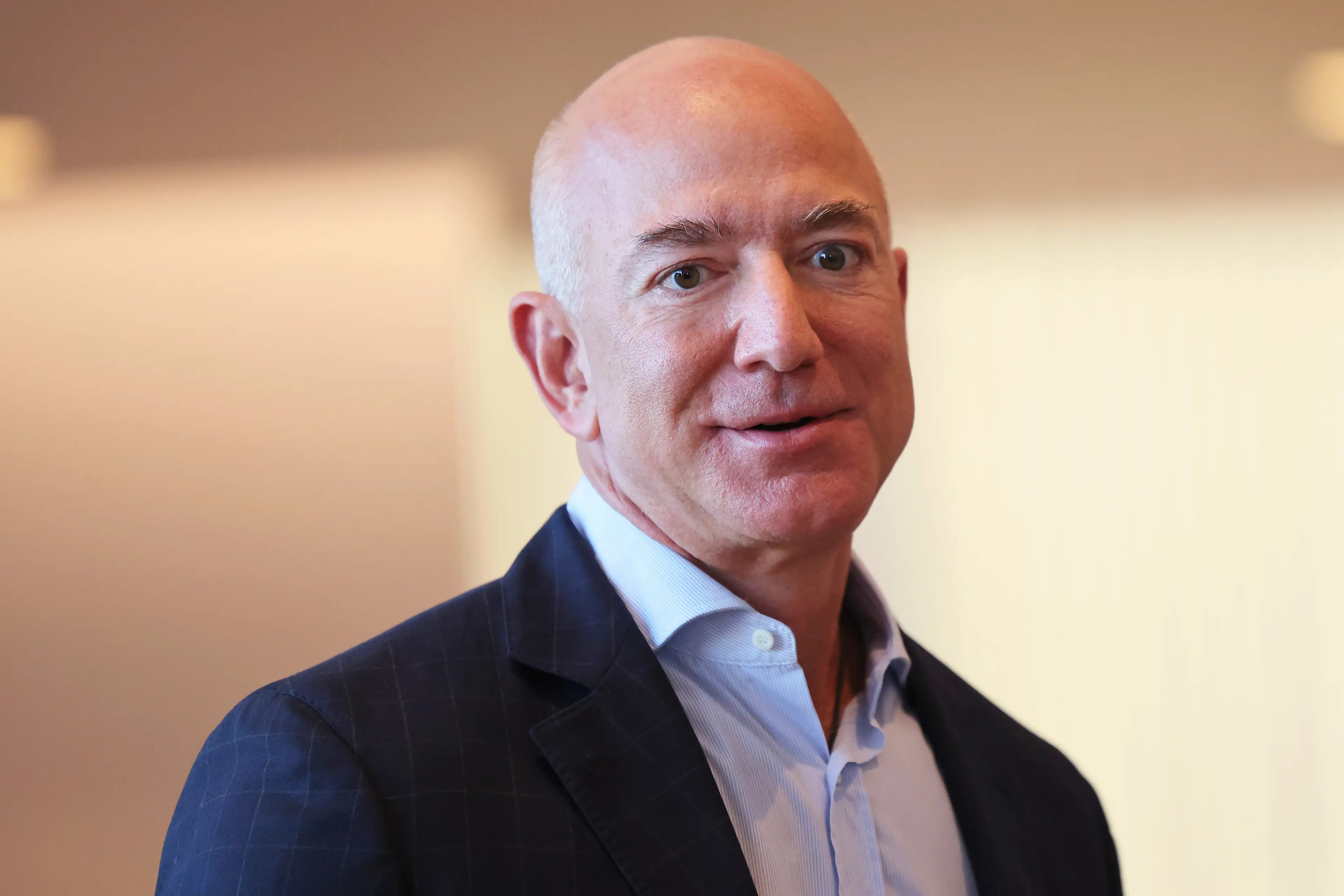 Bezos managed to save some money on the buy... lucky for him (Michael M. Santiago/Getty Images)