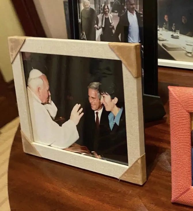 Framed photographs on the island show Epstein meeting Pope John Paul II (House Oversight Committee)