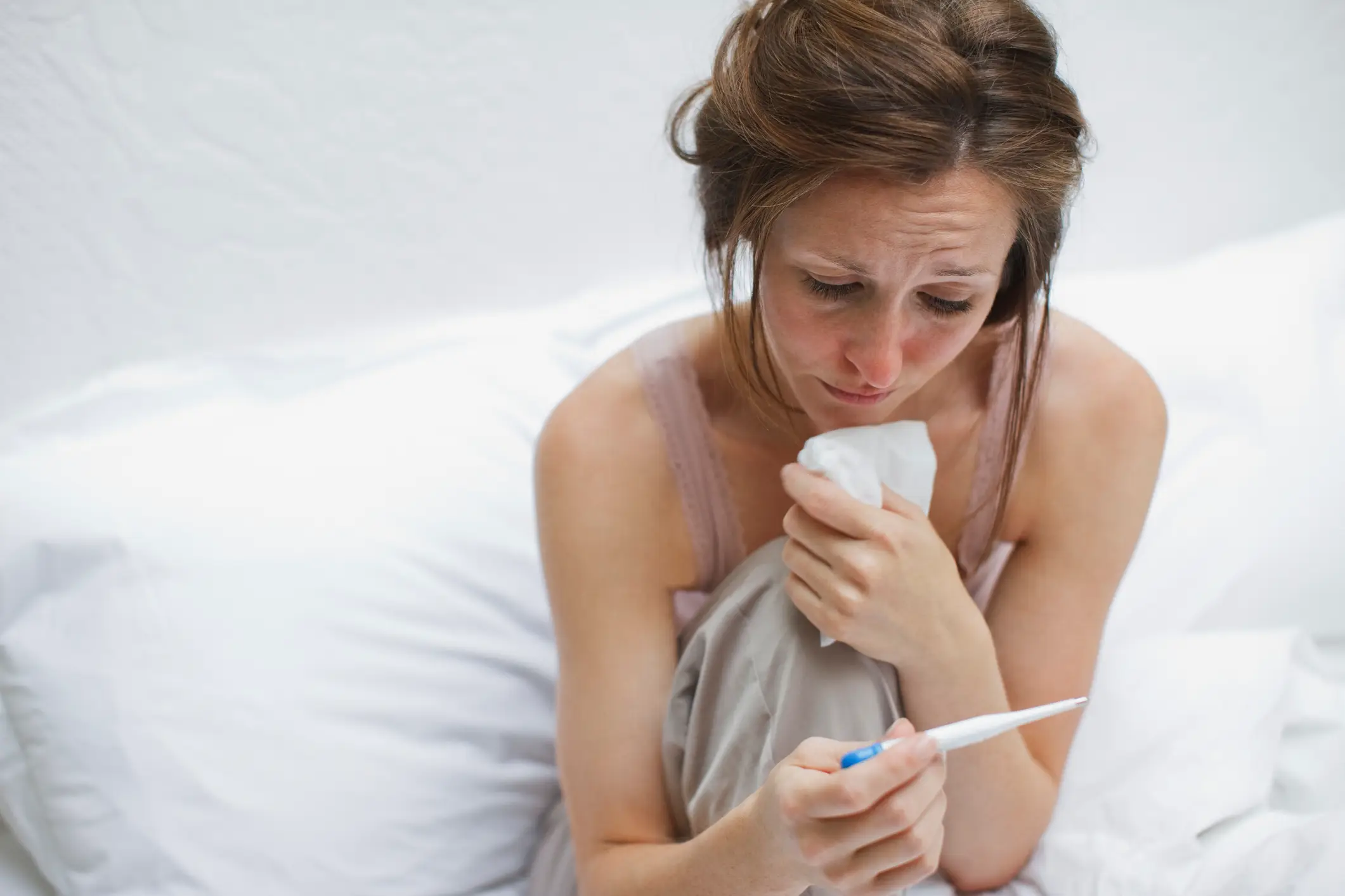 A high fever can be a sign of bird flu (Tom Merton/Getty Images)