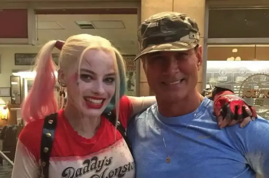 Richard Norton pictured with Margot Robbie (Instagram/@rjnorton70)