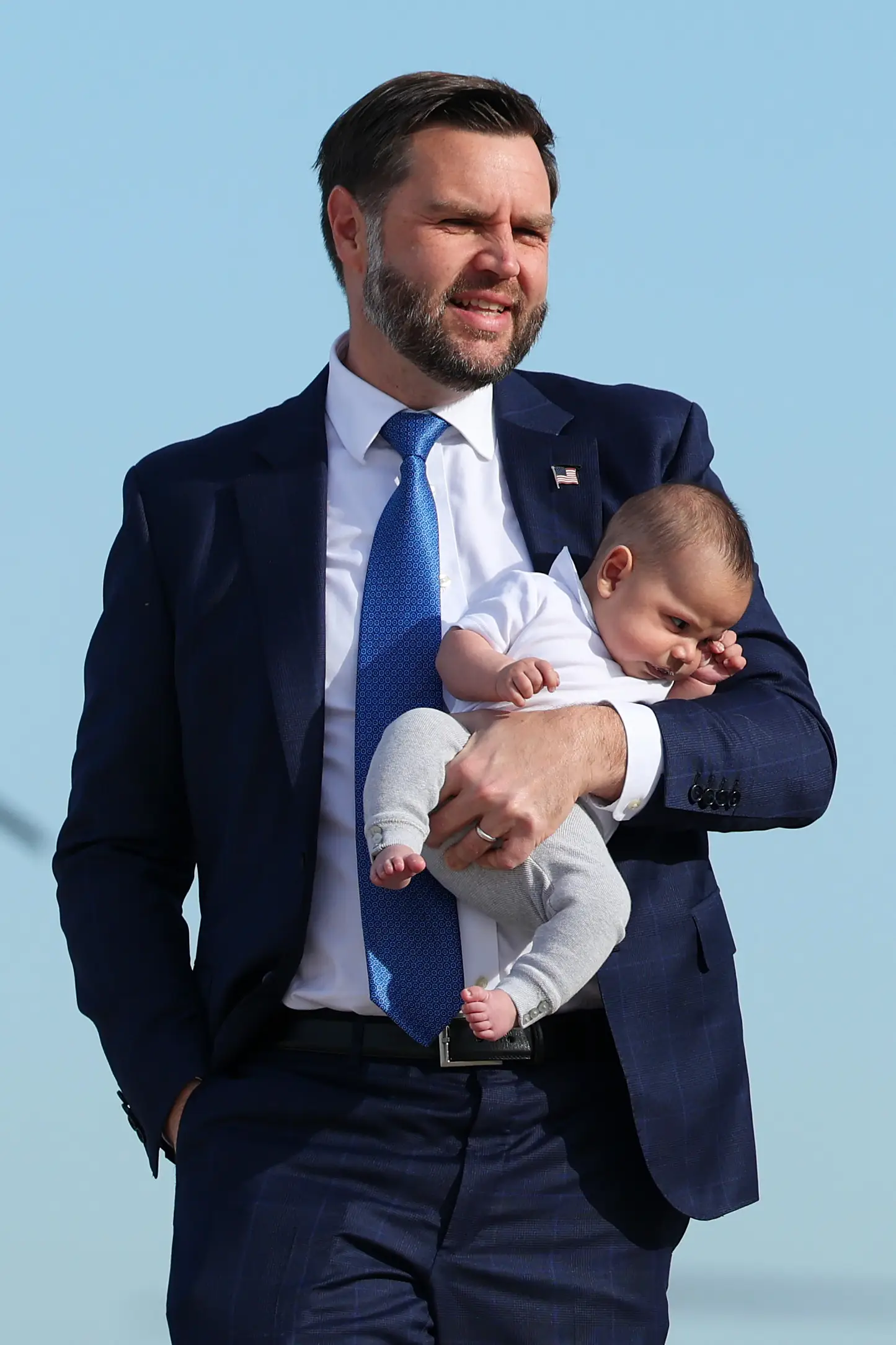 JD Vance pictured with his newborn son Alec (Samuel Corum/Getty Images)