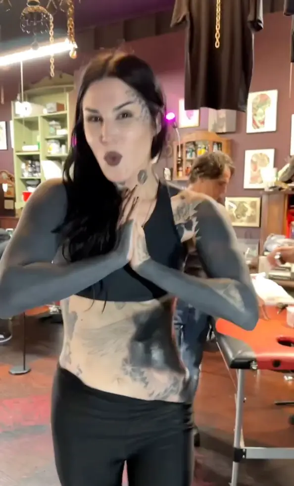 The former LA Ink star appeared happy with the progress.