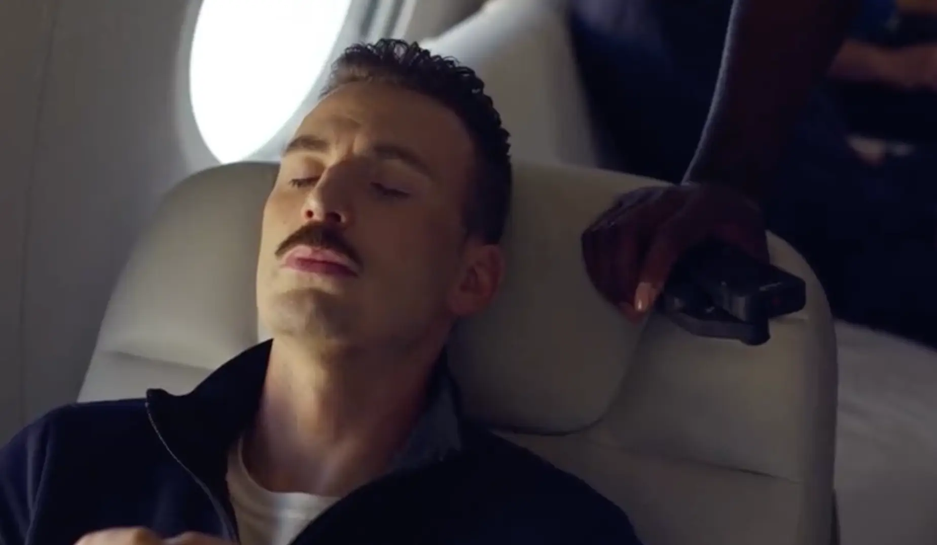 Chris Evans in the coolest tracksuit you've ever seen.