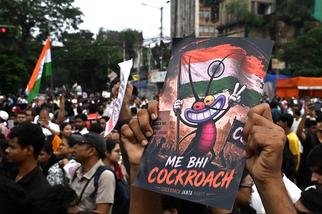 Students supporting the 'Cockroach Movement' in Kolkata, India (Dibyangshu SARKAR / AFP via Getty Images)