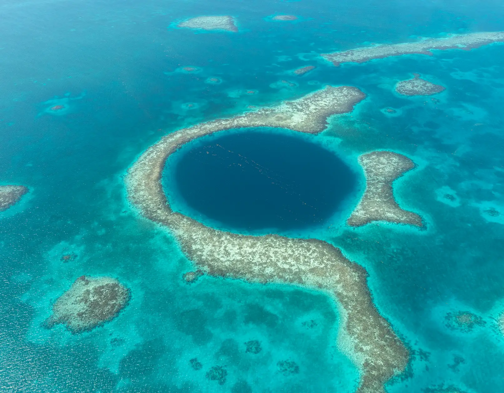 The Great Blue Hole can be seen from space (Getty Stock Photos)