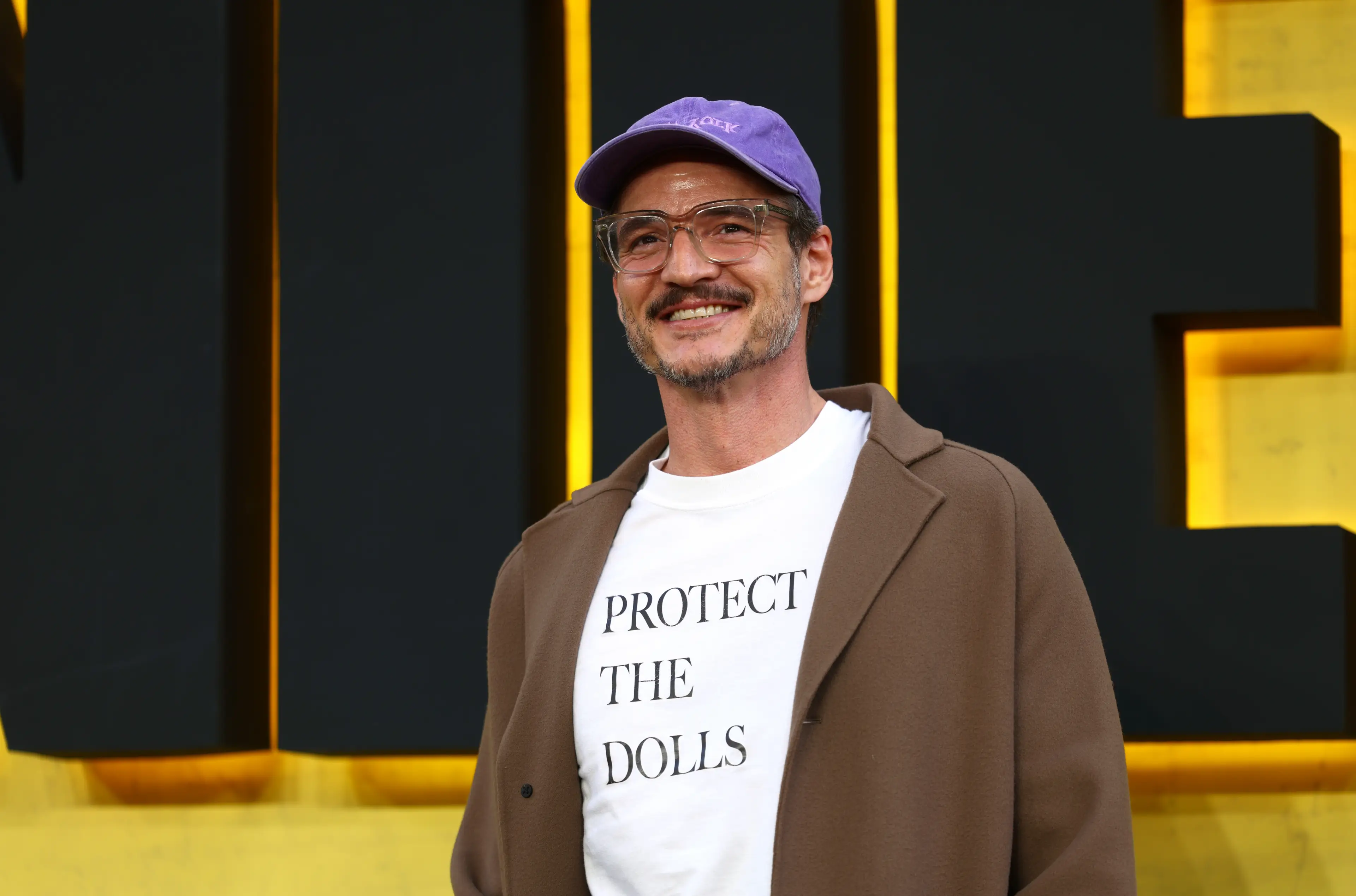 Pedro Pascal seen wearing a 'Protect The Dolls' t-shirt (Tim P. Whitby/Getty Images for The Walt Disney Company Limited)