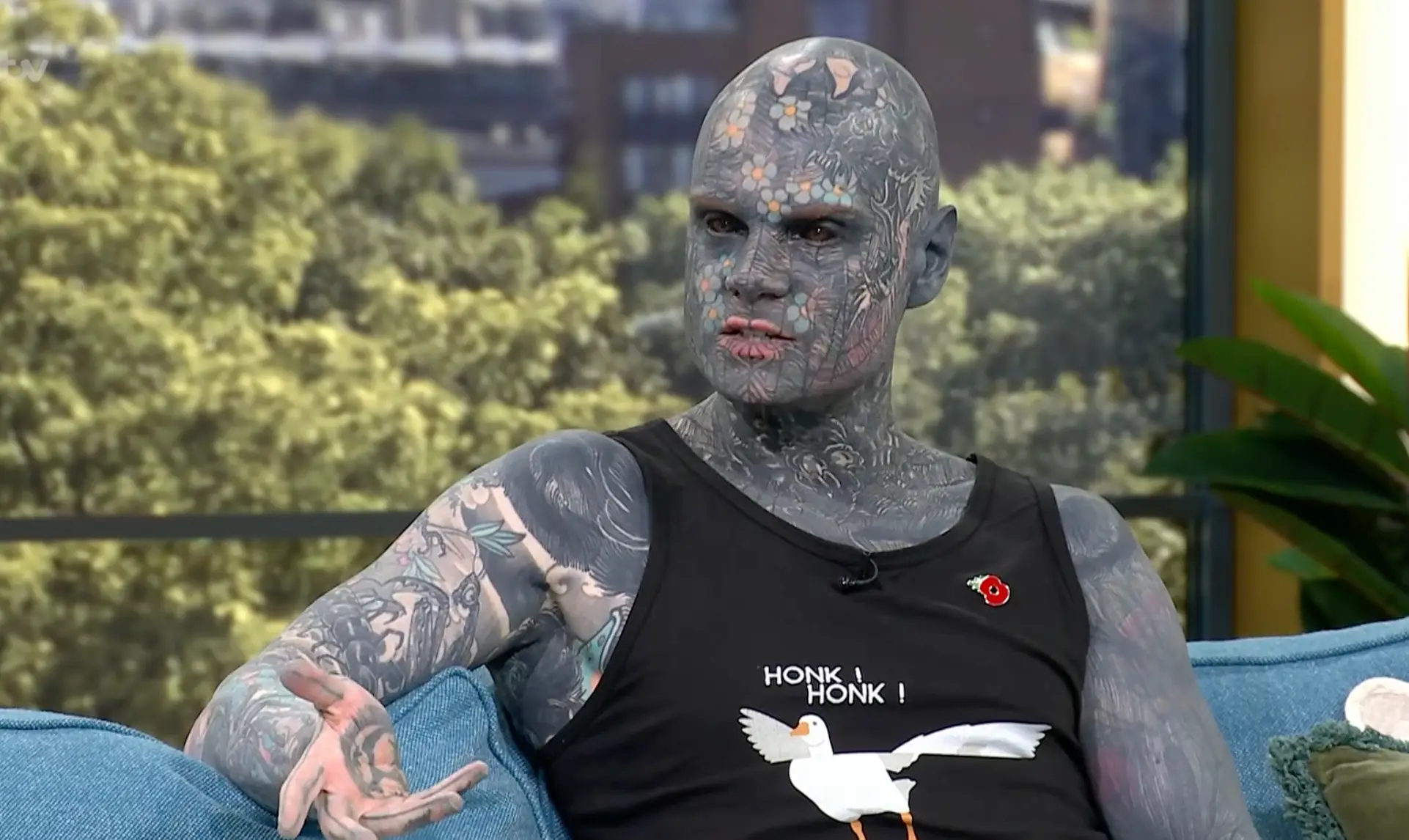The teacher has tattoos across his face and body, including his gums and the whites of his eyes. (Supplied)