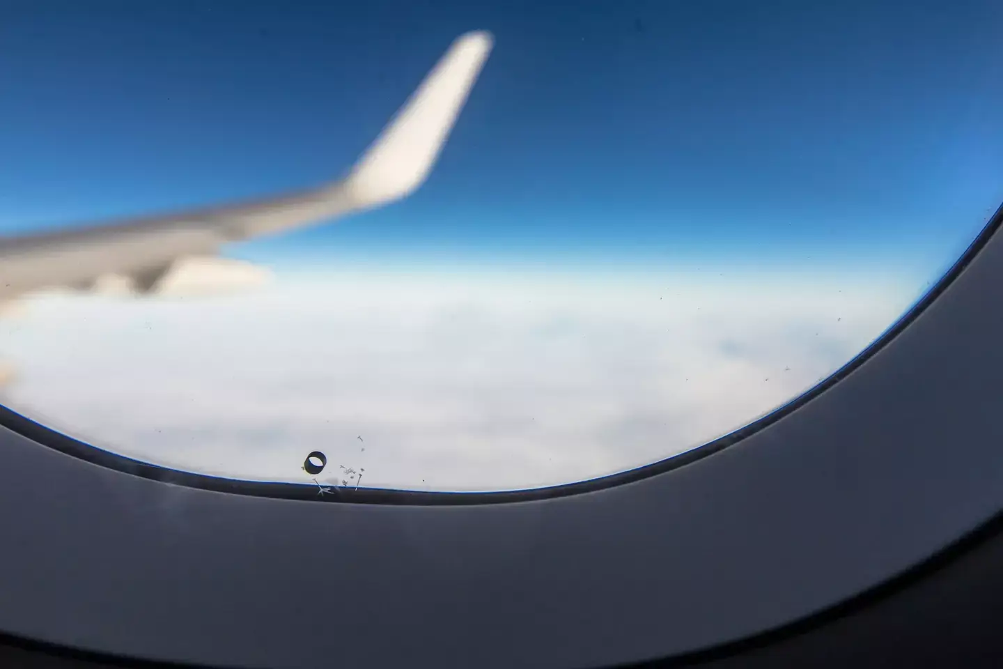 Check your airplane window for the small holes next time you are on a flight(Getty Stock Image)